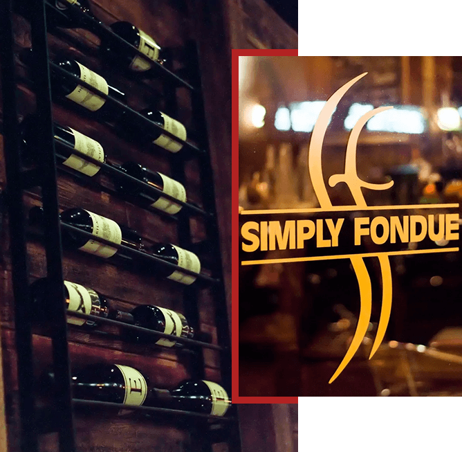 A wine rack with bottles of wine on it.